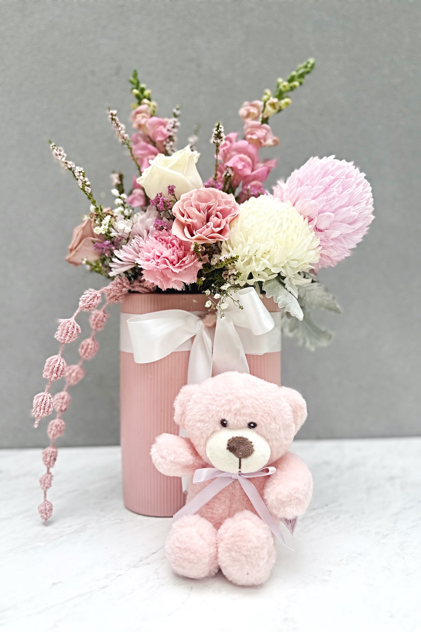 Pink, blush and white flowers for new baby girl arrival with teddy bear | Same day flower delivery Hills District Sydney