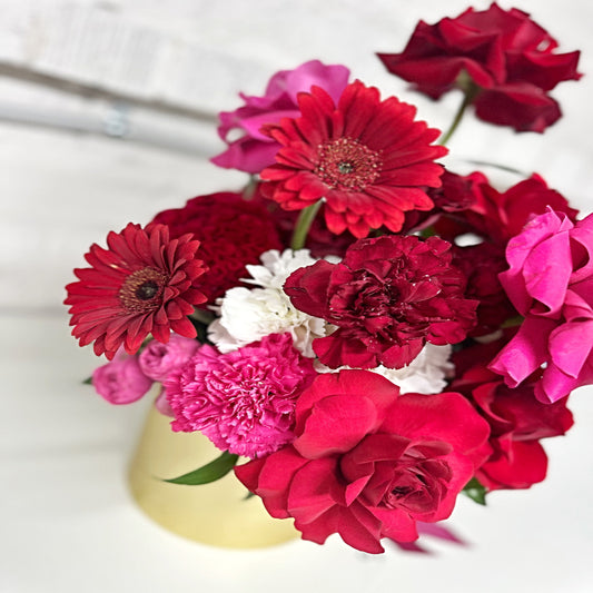 Modern fresh flower arrangement of seasonal red, pink, and white flowers in a gold vase - same day luxury flower delivery Thornleigh, Pennant Hills, Castle Hill, Hills District Sydney