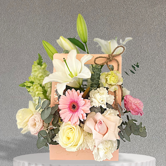 Blushing Carry Box Arrangement