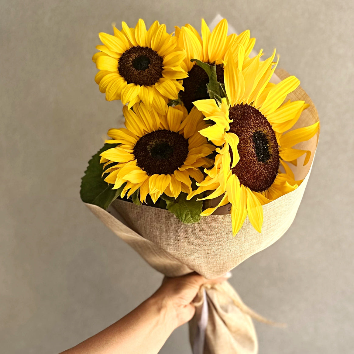 Bouquet of sunflowers wrapped in brown paper  | same day flower delivery Castle Hill