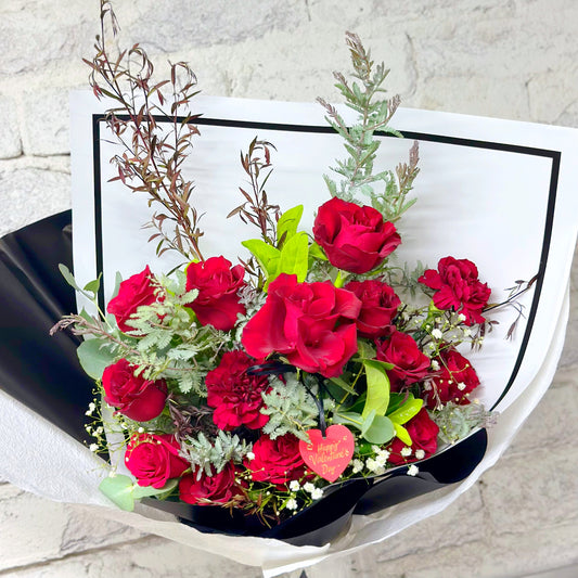 Valentine’s Day bouquet with red roses, carnations and eucalyptus – Hills District florist
