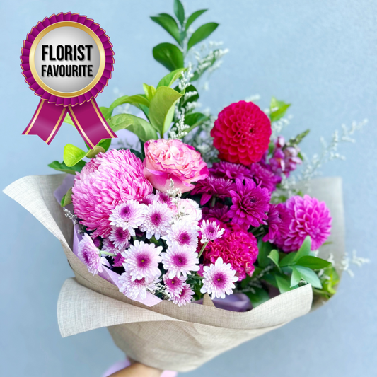 Bouquet of pink and purple seasonal flowers with lush greenery | same day fresh flower delivery Baulkham Hills and North Rocks