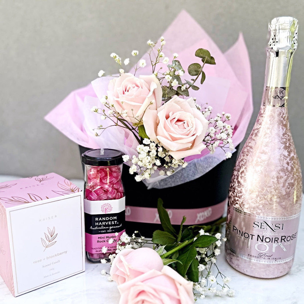 Valentine's Day roses and champagne gift hamper with prosecco, candle and luxury treats Sydney Florist 