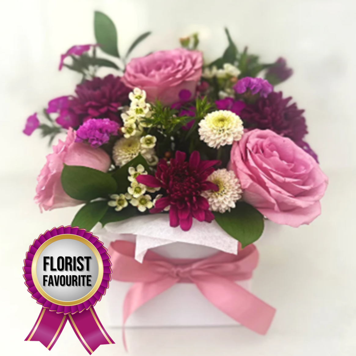 Arrangement of pink and purple roses and chrysanthemums with a pink ribbon | same day fresh flower delivery Beecroft, West Pennant Hills Sydney