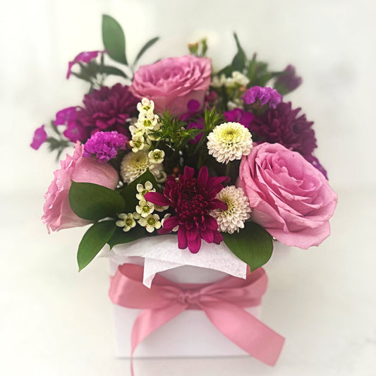Arrangement of pink and purple roses and chrysanthemums with a pink ribbon | same day fresh flower delivery Carlingford Sydney